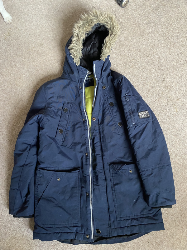 navy blue coat – suitable for senior school.