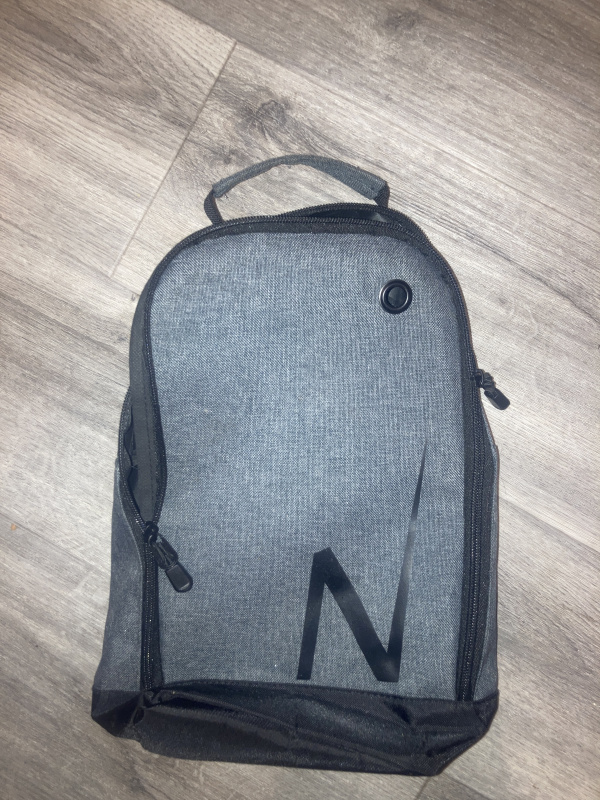 Dark grey shoe bag with black North emblem.